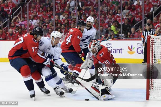 Braden Holtby of the Washington Capitals makes a save against Ondrej Palat of the Tampa Bay Lightning in the second period in Game Six of the Eastern...