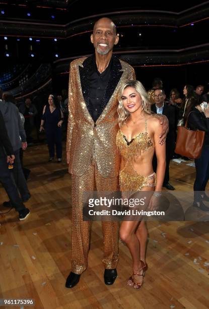 Former NBA player Kareem Abdul-Jabbar and dancer/TV personality Lindsay Arnold pose at ABC's "Dancing with the Stars: Athletes" Season 26 - Finale on...