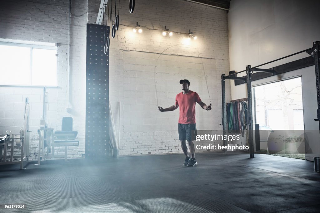 Man skipping in gym