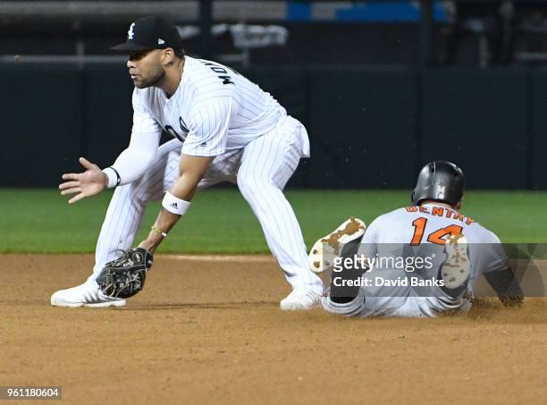 Craig Gentry of the Baltimore Orioles steals second base as Yoan Moncada of the Chicago White Sox waits for the throw during the eighth inning on May...
