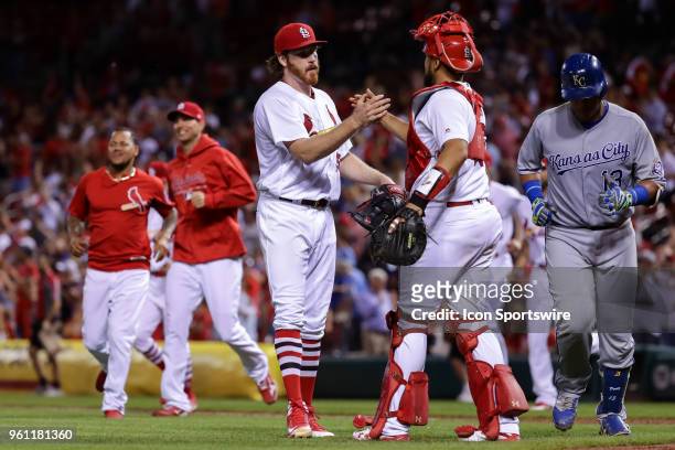 St. Louis Cardinals starting pitcher Miles Mikolas, left, celebrates with St. Louis Cardinals catcher Francisco Pena after throwing a complete game...