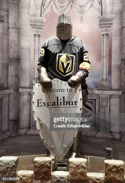 Knight at Excalibur Hotel & Casino wears a jersey of goaltender Marc-Andre Fleury of the Vegas Golden Knights the day after the team won the Western...