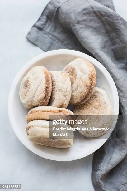 english muffins in bowl - english muffin stock pictures, royalty-free photos & images
