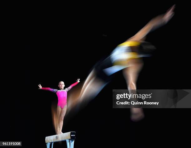 Tyarn Lees of New South Wales competes on the Beam as Ryan Inouye of Western Australia competes on the Floor during the 2018 Australian Gymnastics...
