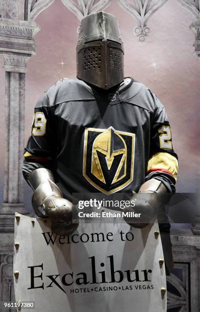 Knight at Excalibur Hotel & Casino wears a jersey of goaltender Marc-Andre Fleury of the Vegas Golden Knights the day after the team won the Western...