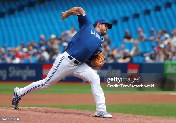 Joe Biagini of the Toronto Blue Jays delivers a pitch in the first inning during MLB game action against the Oakland Athletics at Rogers Centre on...