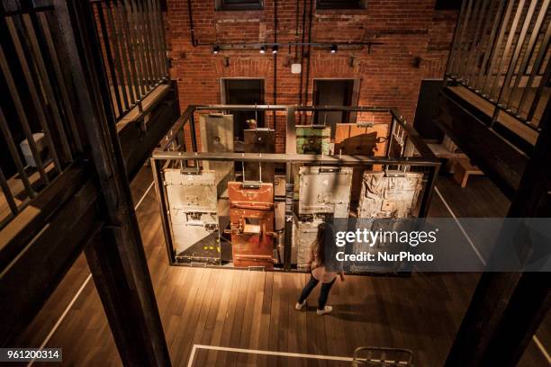 Visitor looks doors of gulag cell prisons in a exhibition of the Gulag History Museum in Moscow, Russia, on 21 May 2018.