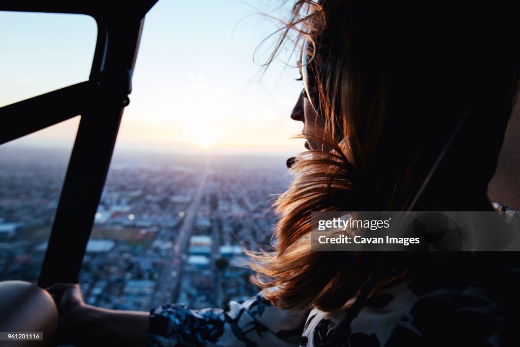 Woman in helicopter