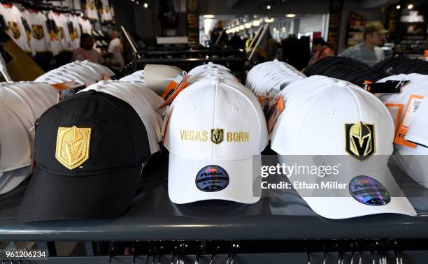 Vegas Golden Knights hats are displayed at the Arsenal retail store at City National Arena the day after the team won the Western Conference Finals...