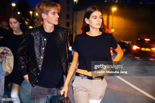 Presley Gerger and Kaia Gerber exit the Burberry show during London Fashion Week Spring/Summer 2018 on September 17, 2017 in London, England.