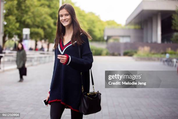 Model Sarah Abt wears an oversized varsity sweater during London Fashion Week Spring/Summer 2018 on September 17, 2017 in London, England.