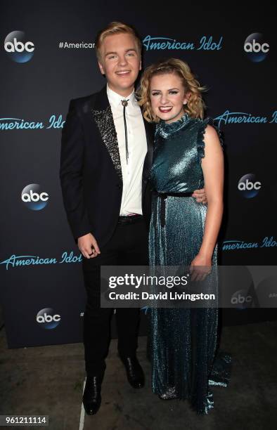 Singers Caleb Lee Hutchinson and Maddie Poppe attend ABC's "American Idol" - Finale on May 21, 2018 in Los Angeles, California.