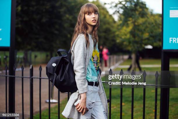 Model Maria Clara wears a black rainproof backpack during London Fashion Week Spring/Summer 2018 on September 18, 2017 in London, England.