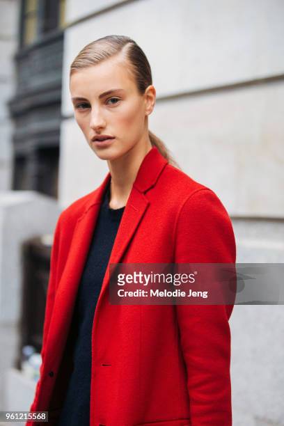 Model Rachel Fox wears a red blazer during London Fashion Week Spring/Summer 2018 on September 18, 2017 in London, England.