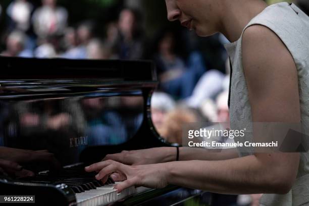 Italian pianist Maddalena Giacopuzzi performs in the gardens of the Villa Belgiojoso Bonaparte on May 20, 2018 in Milan, Italy. Piano City is a music...