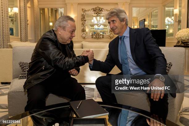 West Ham United's new manager Manuel Pellegrini poses with West Ham Joint-Chairman David Sullivan on May 21, 2018 in London, England.