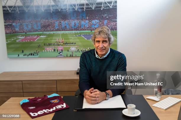 West Ham United's new manager Manuel Pellegrini poses on May 21, 2018 in London, England.