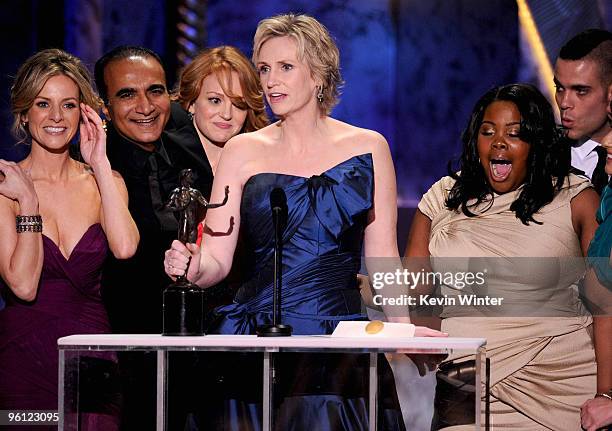 Actress Jane Lynch with cast members of "Glee" accept the Ensemble In A Comedy Series award onstage at the 16th Annual Screen Actors Guild Awards...