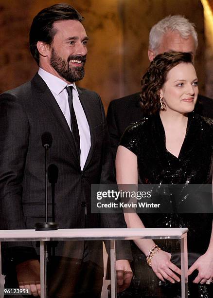 Actor Jon Hamm and actress Elisabeth Moss accept the Ensemble In A Drama Series award for "Mad Men" onstage at the 16th Annual Screen Actors Guild...