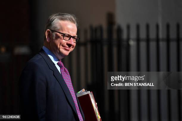 Britain's Environment, Food and Rural Affairs Secretary Michael Gove arrives at 10 Downing Street in central London on May 22, 2018 for a meeting of...