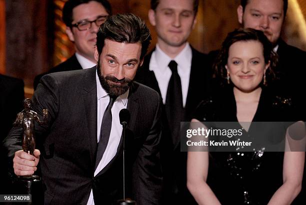 Actor Jon Hamm and actress Elisabeth Moss accept the Ensemble In A Drama Series award for "Mad Men" onstage at the 16th Annual Screen Actors Guild...