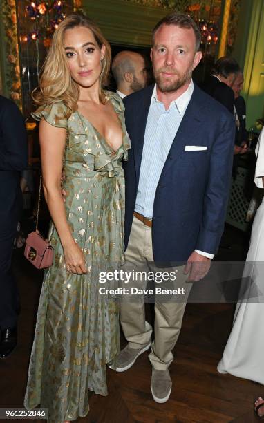 Jacqui Ainsley and Guy Ritchie attend the Annabel's x Dior dinner on May 21, 2018 in London, England.