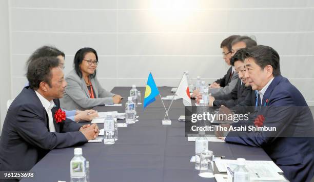 Palau President Tommy Remengesau and Japanese Prime Minister Shinzo Abe talk during their bilateral meeting on the sidelines of the Pacific Alliance...