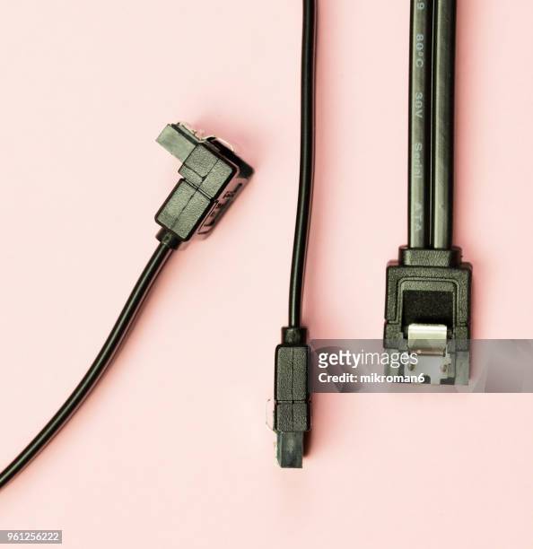 black esata cable for connecting a hard drive to the motherboard, computer component - kabel stock pictures, royalty-free photos & images