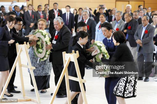 Japanese Prime Minister Shinzo Abe , his wife Akie , Samoa Prime Minister Tuilaepa Lupesoliai Sailele Malielegaoi and his wife Gillian Muriel...