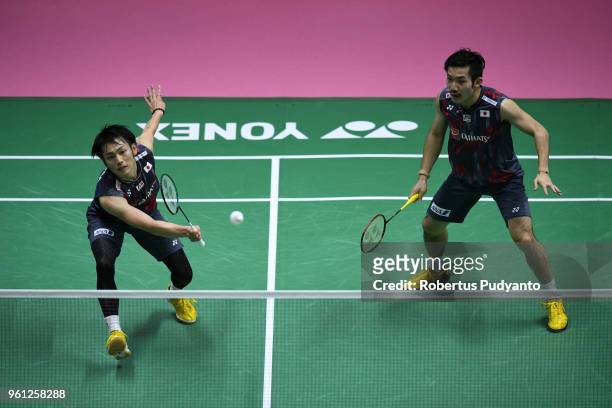Takeshi Kamura and Keigo Sonoda of Japan compete against Mark Lamsfuss and Marvin Emil Seidel of Germany during Preliminary Round on day three of the...