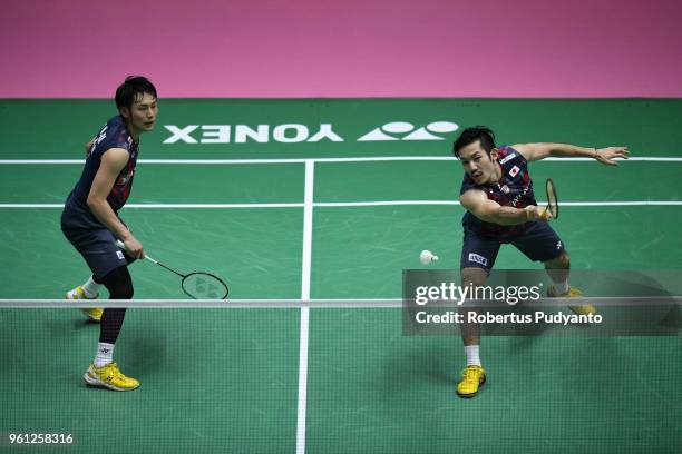 Takeshi Kamura and Keigo Sonoda of Japan compete against Mark Lamsfuss and Marvin Emil Seidel of Germany during Preliminary Round on day three of the...