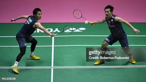 Takeshi Kamura and Keigo Sonoda of Japan compete against Mark Lamsfuss and Marvin Emil Seidel of Germany during Preliminary Round on day three of the...