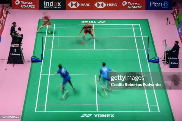 Kim Astrup and Anders Skaarup Rasmussen of Denmark compete against Evgenij Dremin and Denis Grachev of Russia during Preliminary Round on day three...