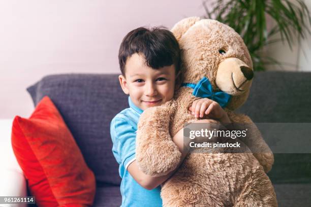 cute child and teddy bear - child teddy bear stock pictures, royalty-free photos & images