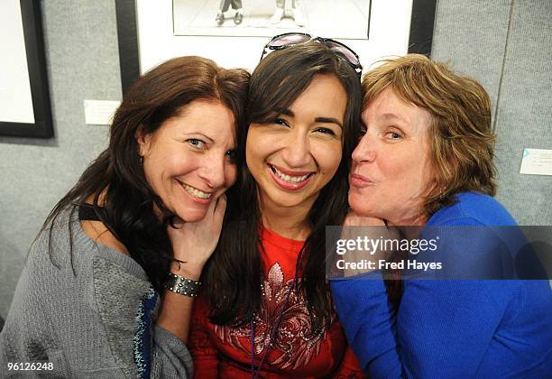 Guests pose at the Music Cafe during the 2010 Sundance Film Festival at Stanfield Gallery on January 23, 2010 in Park City, Utah.