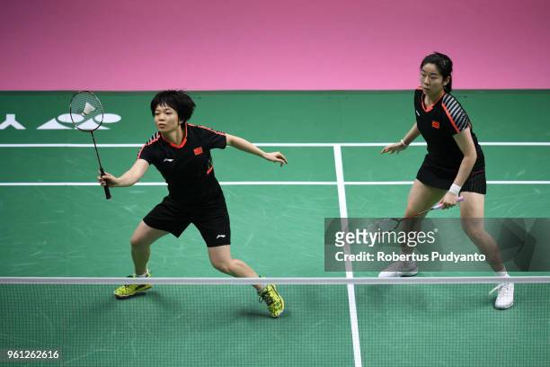 Chen Qingchen and Jia Yifan of China compete against Yea Ching Goh and Soong Fie Cho of Malaysia during Preliminary Round on day three of the BWF...