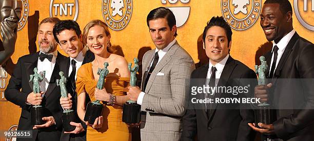 Actors Christoph Waltz, B.J. Novak, actress Diane Kruger, actors Eli Roth, Omar Doom and Jacky Ido pose with their trophies for Outstanding...