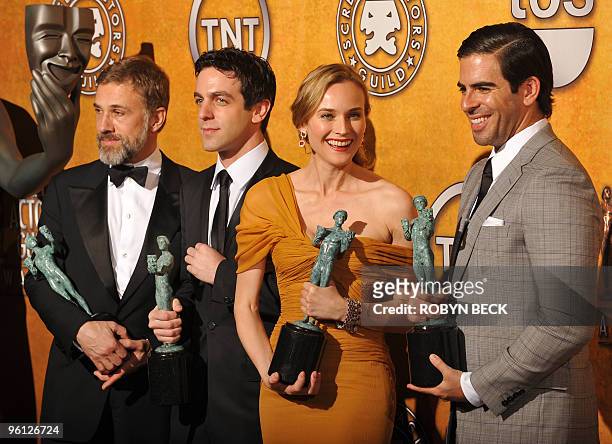 Actors Christoph Waltz, B.J. Novak, actress Diane Kruger, and actor Eli Roth, pose with their trophies for Outstanding Performance by a Cast in a...