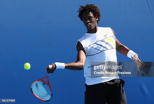 Gianni Mina of France plays a forehand in his first juniors match against Matteo Civarolo of Italy during day seven of the 2010 Australian Open at...