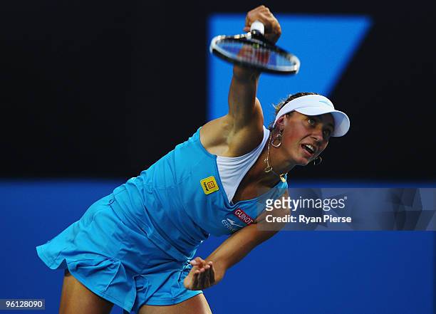 Yanina Wickmayer of Belgium serves in her fourth round match against Justine Henin of Belgium during day seven of the 2010 Australian Open at...