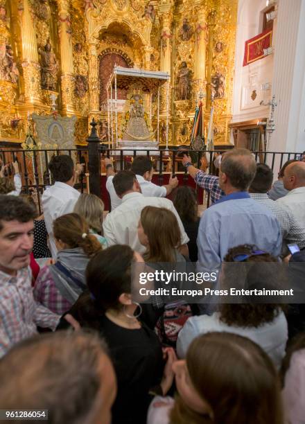 Pilgrims gather around the statue of the Rocio Virgin during the procession in the village of El Rocio on May 21, 2018 in El Rocio, Spain. El Rocio...