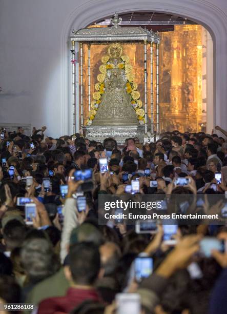 Pilgrims gather around the statue of the Rocio Virgin during the procession in the village of El Rocio on May 21, 2018 in El Rocio, Spain. El Rocio...