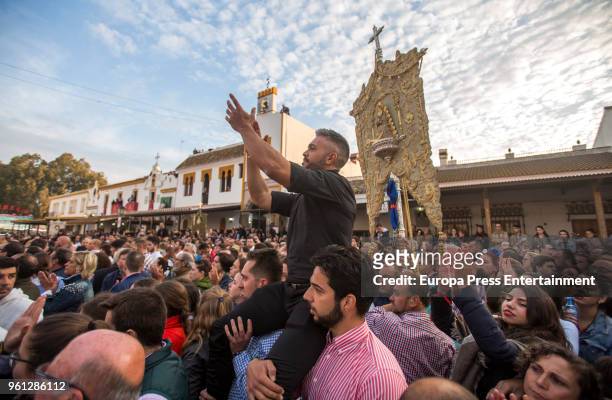 Pilgrims gather around the statue of the Rocio Virgin during the procession in the village of El Rocio on May 21, 2018 in El Rocio, Spain. El Rocio...