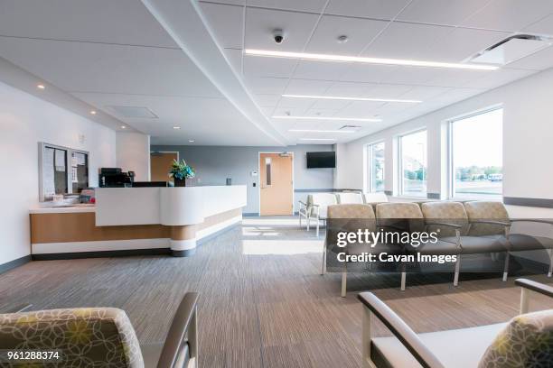 chairs arranged in medical building - 病院　待合室 ストックフォトと画像