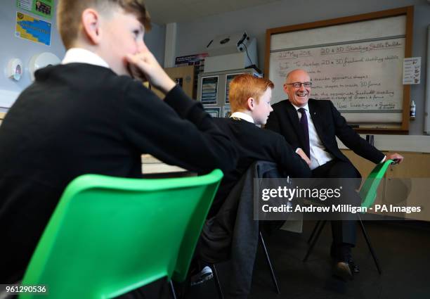 Education Secretary John Swinney sits in a class at Clydebank High School in Clydebank where he announced Scottish Attainment Challenge funding.
