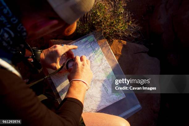 Guy Using A Compass Compass Pose Photos and Premium High Res Pictures - Getty Images