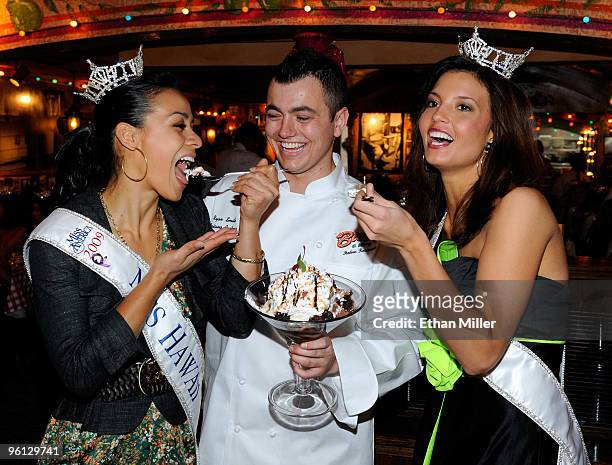 Raeceen Anuenue Woolford, Miss Hawaii, Buca di Beppo general manager Ryan Smith and Kara Jackson, Miss Idaho, appear with Buca di Beppo's new Brownie...