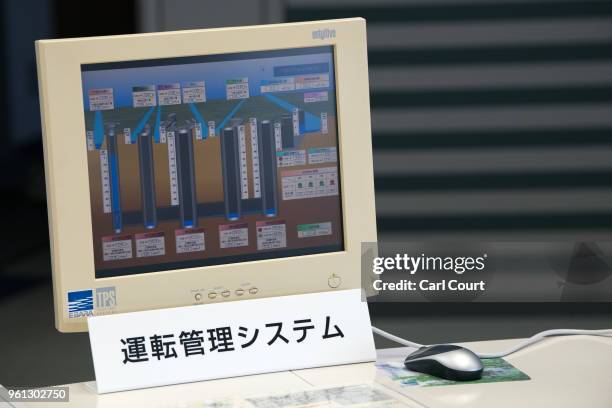 Computer screen displaying tank information is pictured in the control room of the Tokyo Metropolitan Area Outer Underground Discharge Channel on May...