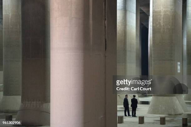 Members of a VIP delegation wait in the pressure-adjusting water tank of the Tokyo Metropolitan Area Outer Underground Discharge Channel on May 22,...
