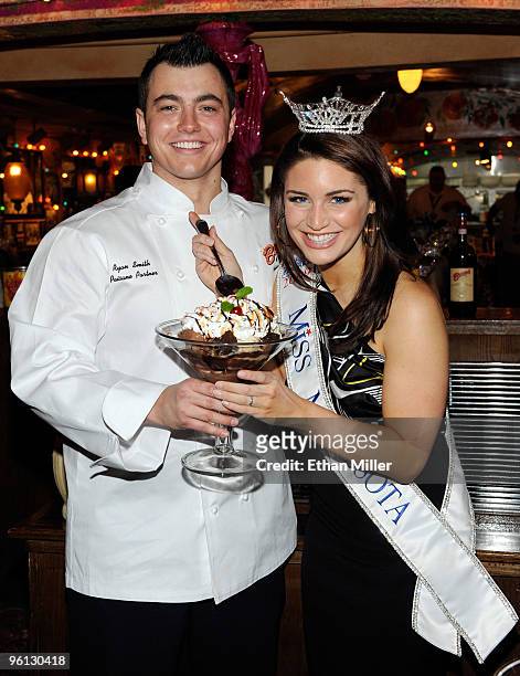 Buca di Beppo general manager Ryan Smith and Brooke Kelly Kilgarriff, Miss Minnesota, appear with Buca di Beppo's new Brownie Sundae as contestants...